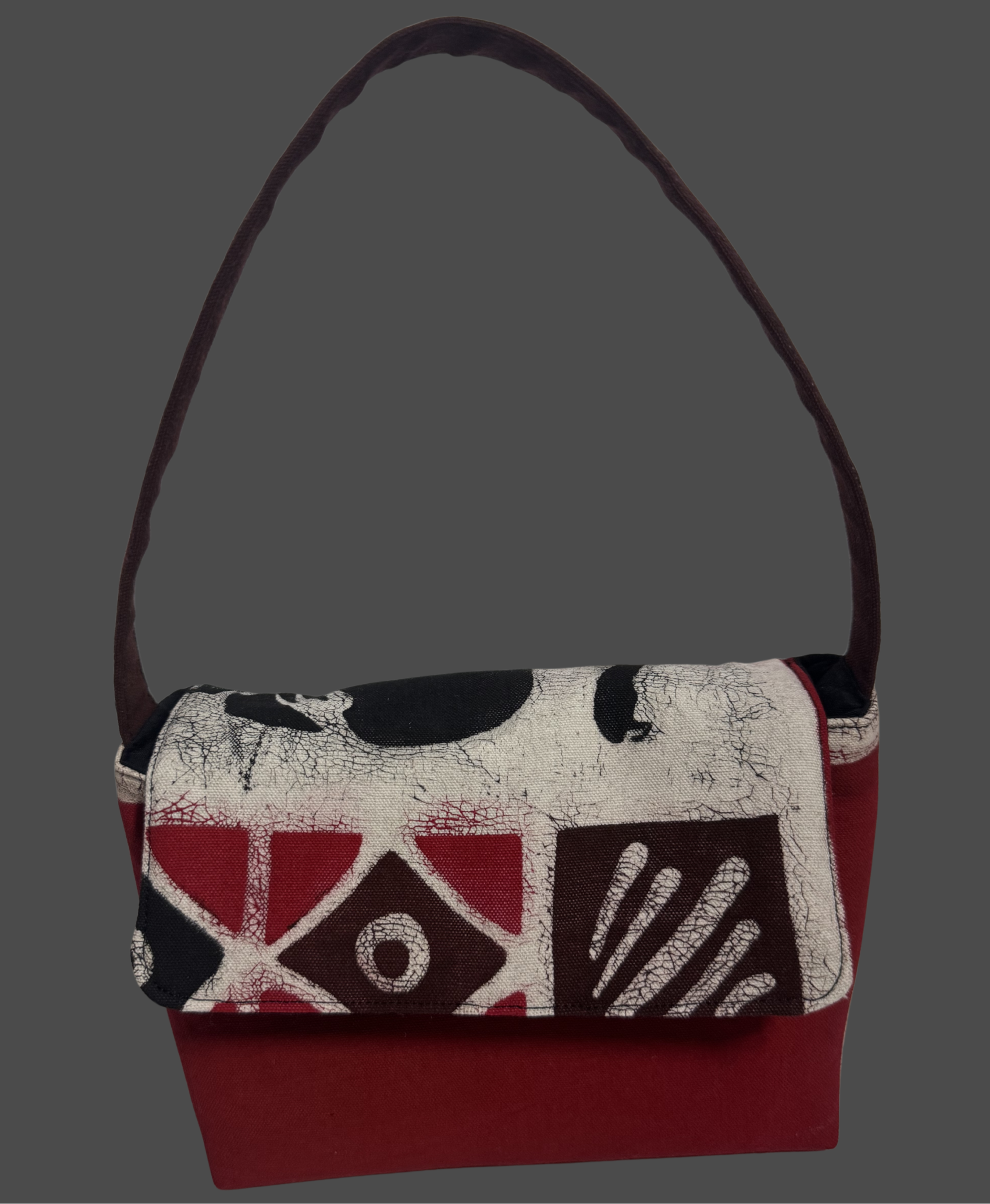 Handbag with geometric pattern on a gray background